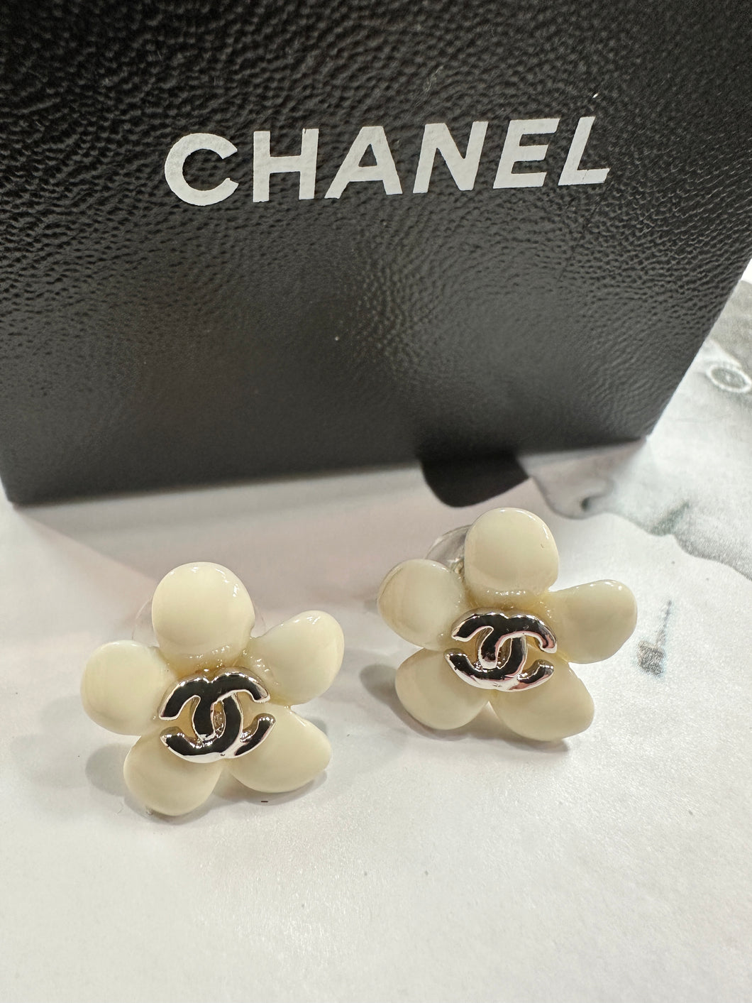 Chanel camellia earrings deals