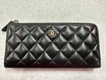 Authentic Chanel Black Lambskin Quilted Zipper Wallet
