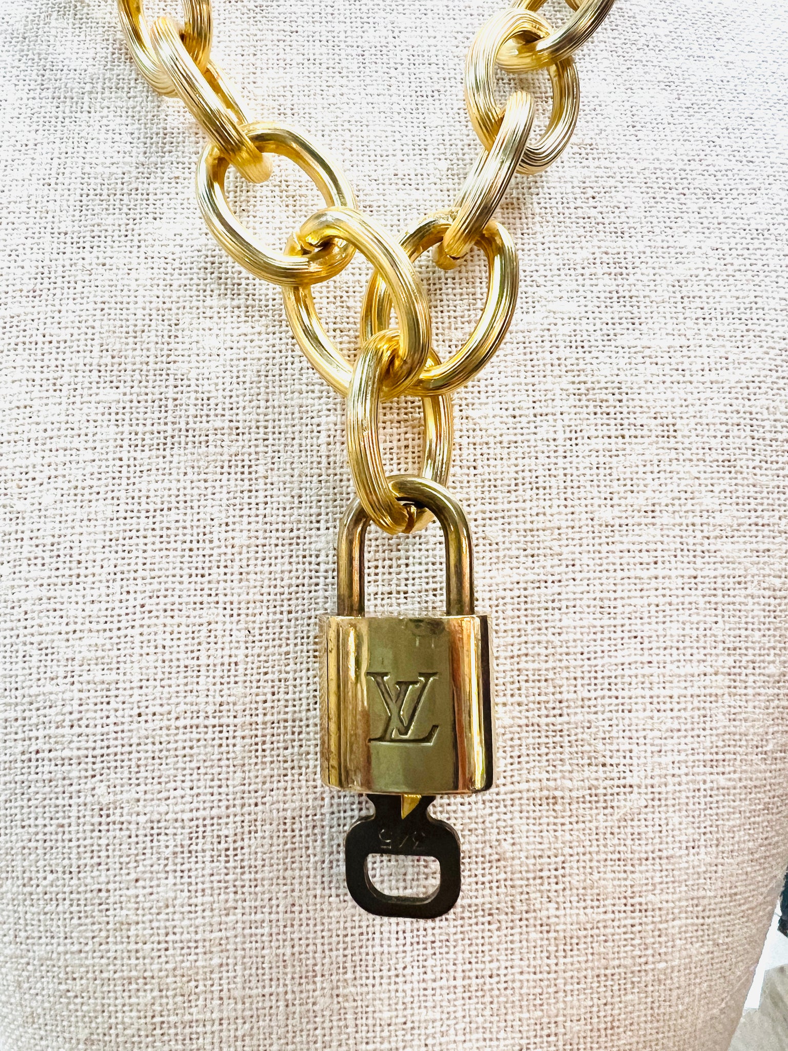 Authentic Louis Vuitton LV Lock Pendant