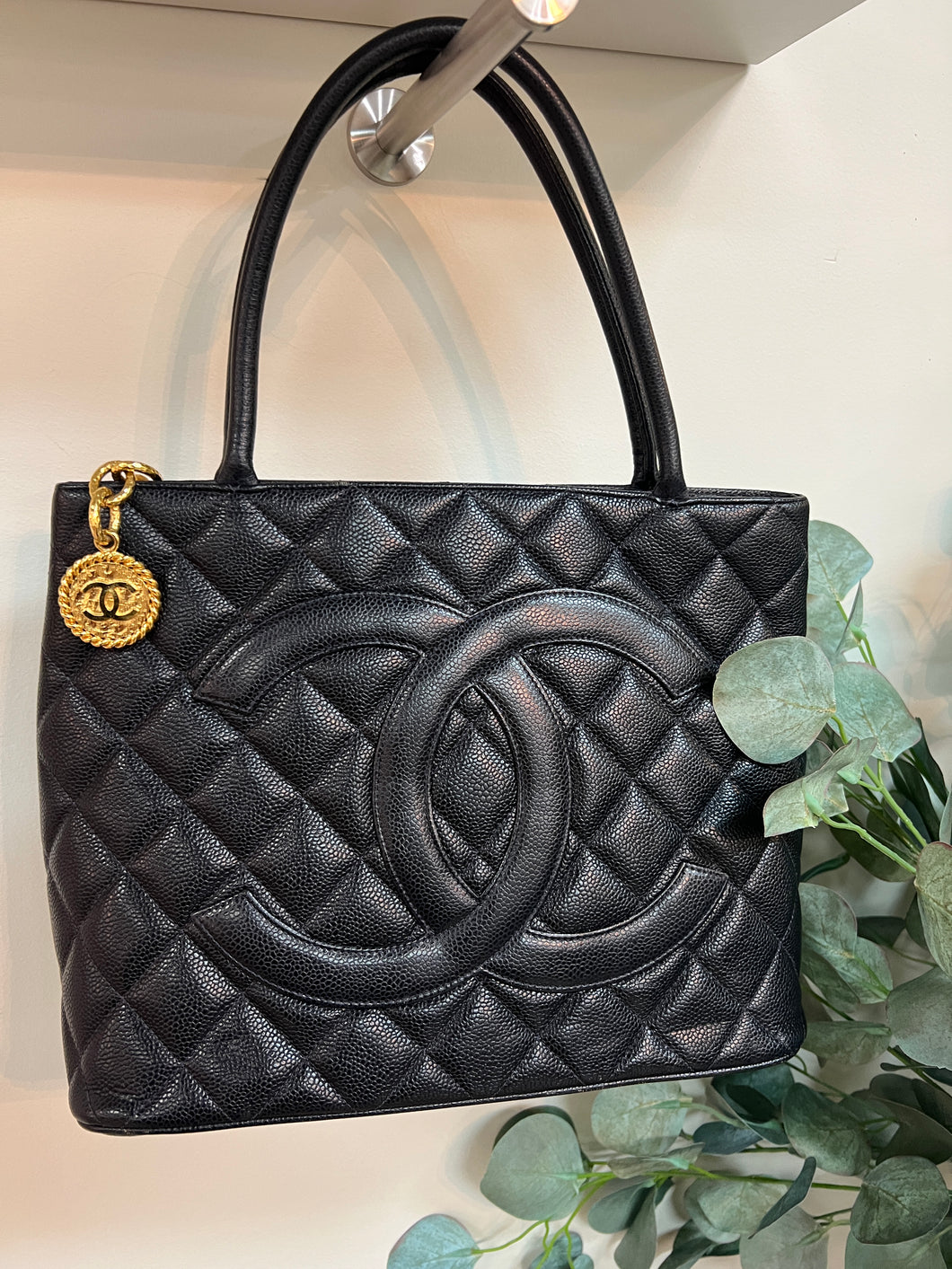 Authentic Chanel Navy Medallion Tote with Gold Hardware