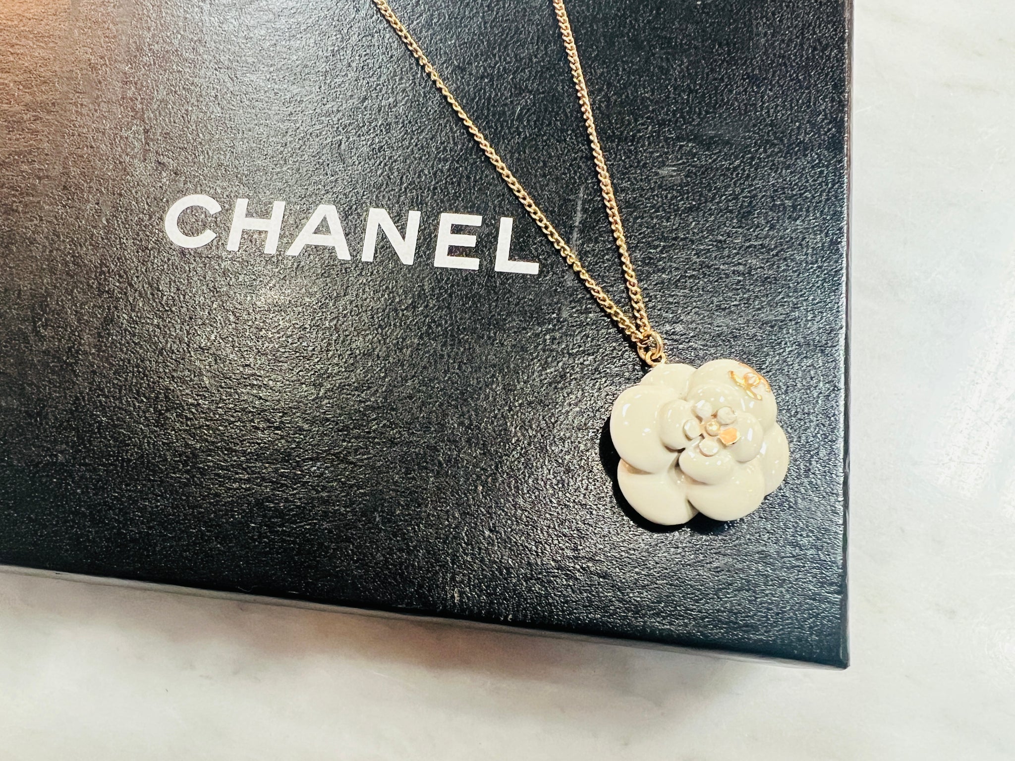 Authentic Chanel Camelia Pendant Necklace – Relics to Rhinestones