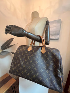 LOUIS VUITTON 35 SPEEDY BAG, with monogram coated canvas and