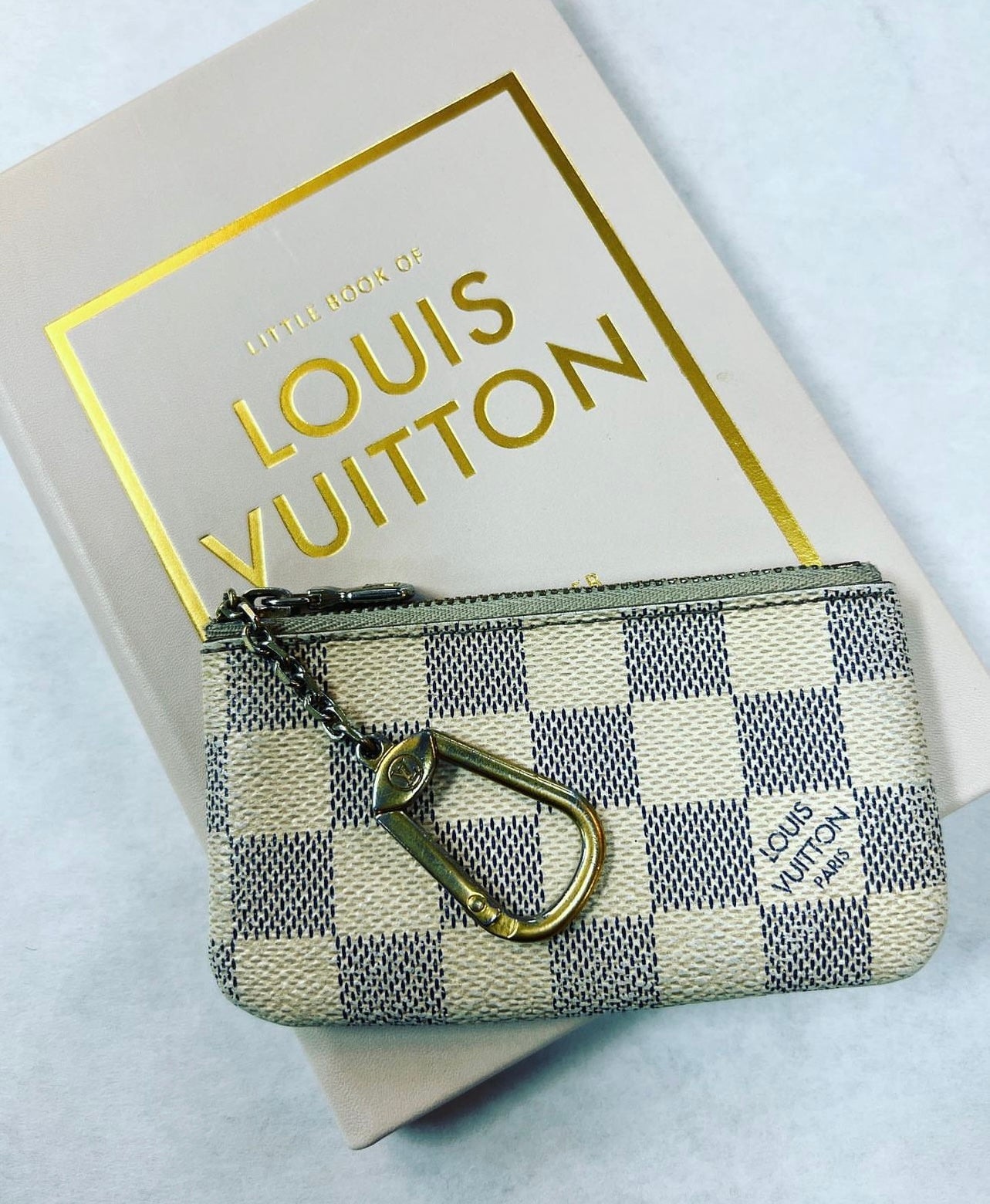 Authentic Louis Vuitton Key Pouch in Damier Azur – Relics to Rhinestones