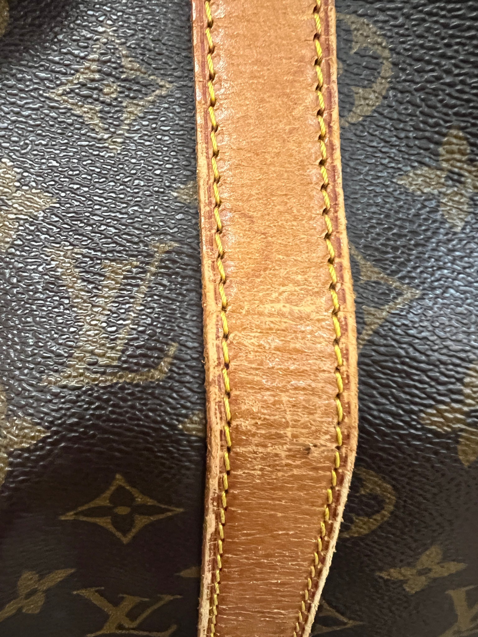 where is the serial number on a louis vuitton bag